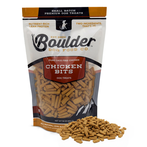 A 16oz bag of Boulder Dog Food Co. Chicken Bits, featuring pure, cage-free chicken treats handcrafted in Boulder, Colorado.