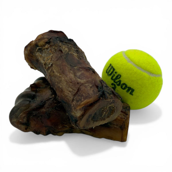 Boulder Dog Food Co. Baked Bison Split Shin Bone, a long-lasting single-ingredient chew for aggressive chewers. 100% natural and responsibly sourced bison.