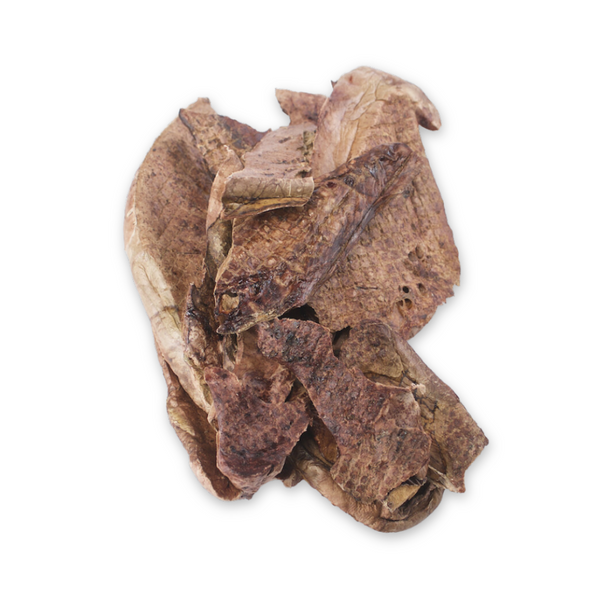 Close-up of Boulder Dog Food Lamb Wafers, showing the light and crispy texture of 100% lamb lung. Large wafers that are easy to break for precision training.