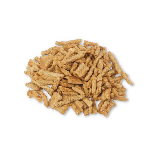 Close-up of Boulder Dog Food Chicken Bits, small-sized chicken breast rewards. Perfect high-value treats for puppy training, agility, and repetitive rewarding.